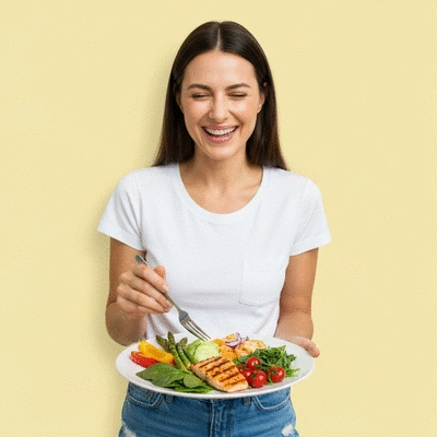 Woman enjoying a healthy meal with fresh ingredients, illustrating hormone-friendly nutrition